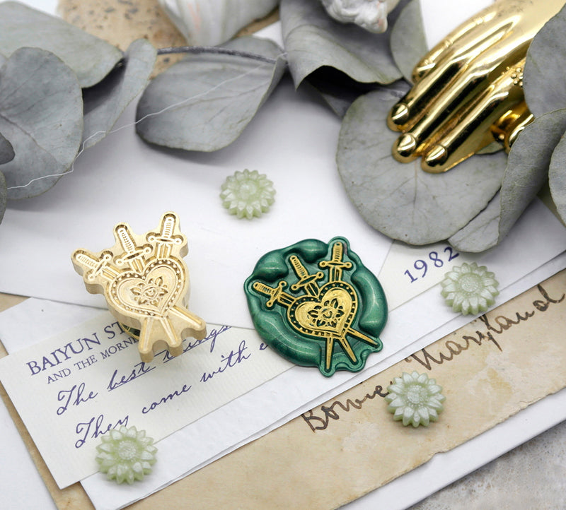 Wax Seal Stamp, created a wax seal with A heart pierced by three swords design
