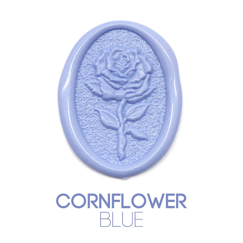 a rose flower wax seal just to show the effect of cornflower blue sealing wax sticks.
