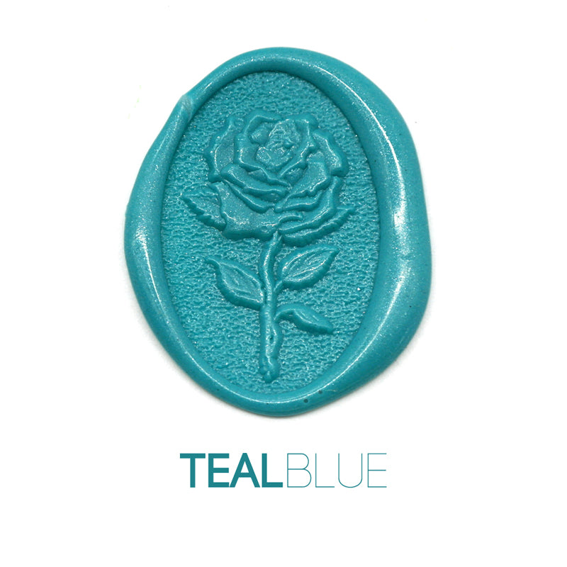 a rose flower wax seal just to show the effect of teal blue sealing wax sticks.