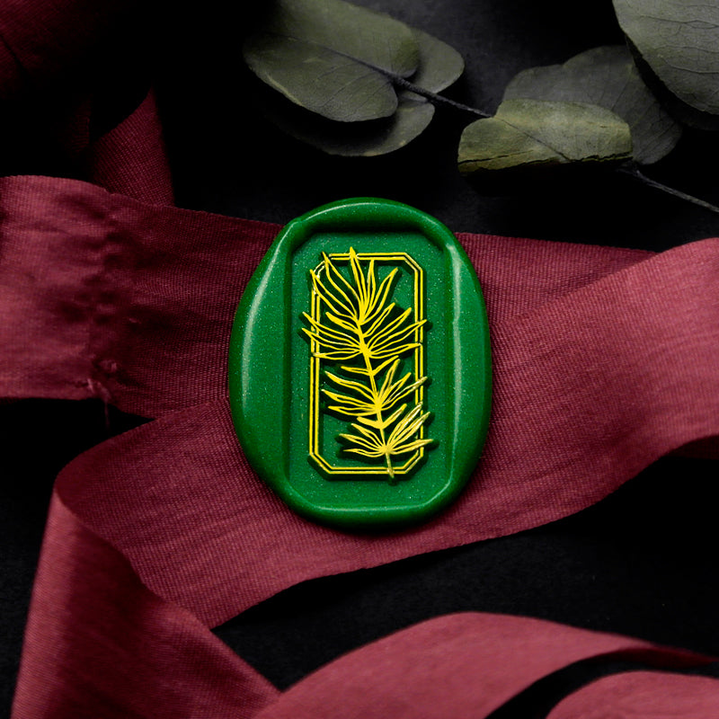Wax Seal Stamp, created a rectangle green wax seal on a red ribbon with leaves design