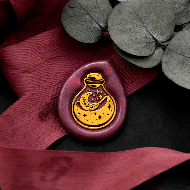 Wax Seal Stamp, created a wax seal on a red ribbon with galaxy universe drifting bottle design