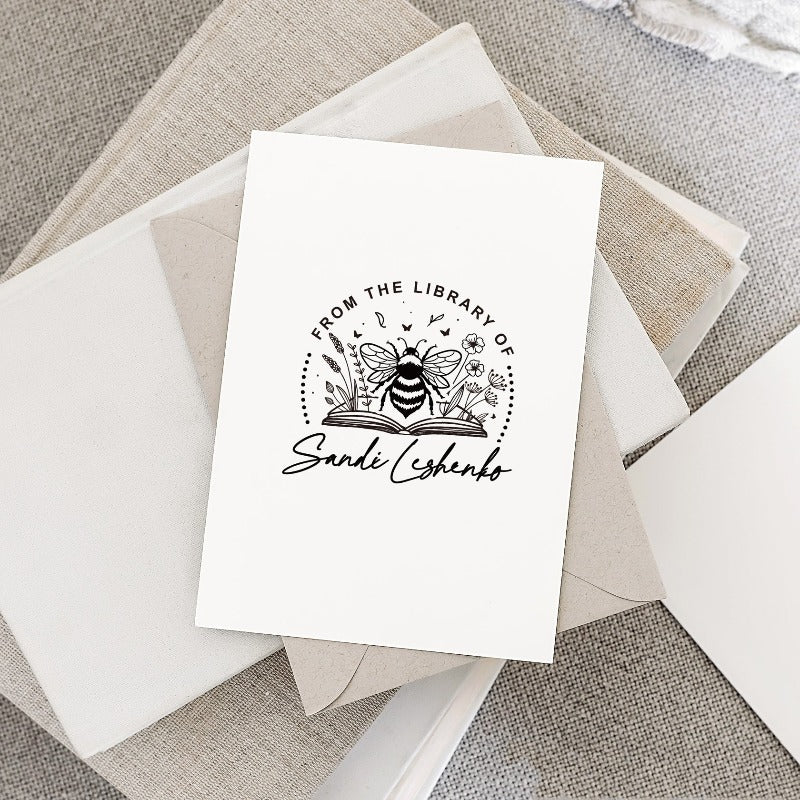 Custom your Book Stamp, with text from the library of your name, bee and books graphic.