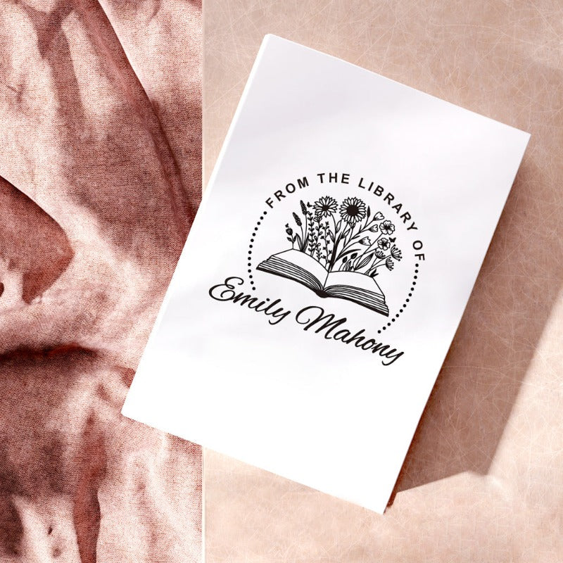 Custom your Book Stamp, with text from the library of your name, sunflowers and book graphic.