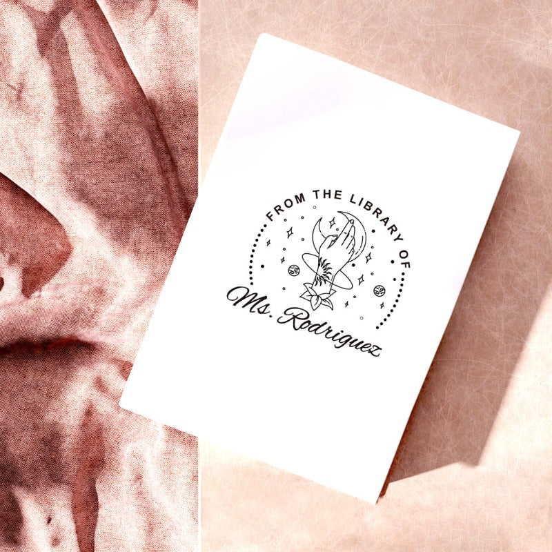 Custom your Book Stamp, with text from the library of your name, moon and hand graphic.