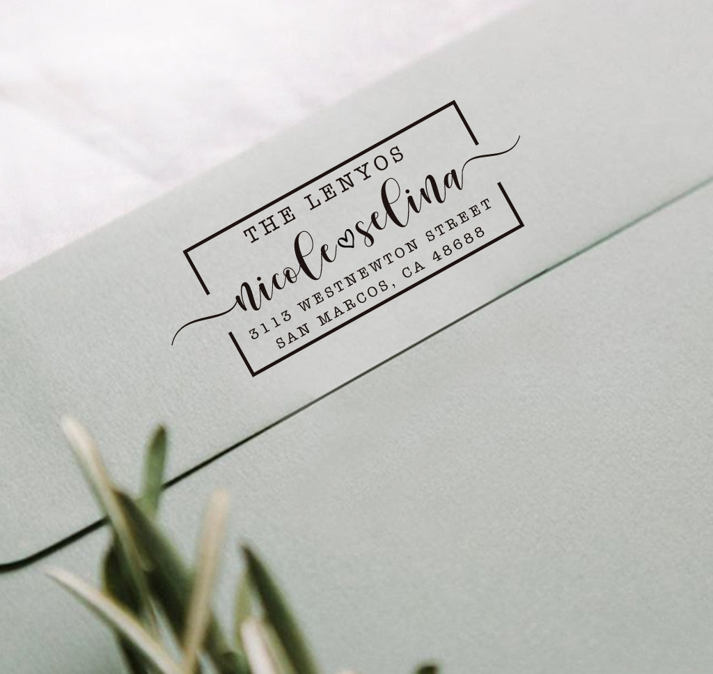 A personalized self inking address stamp, customized with your shop name and address, stamped on the gray envelope.