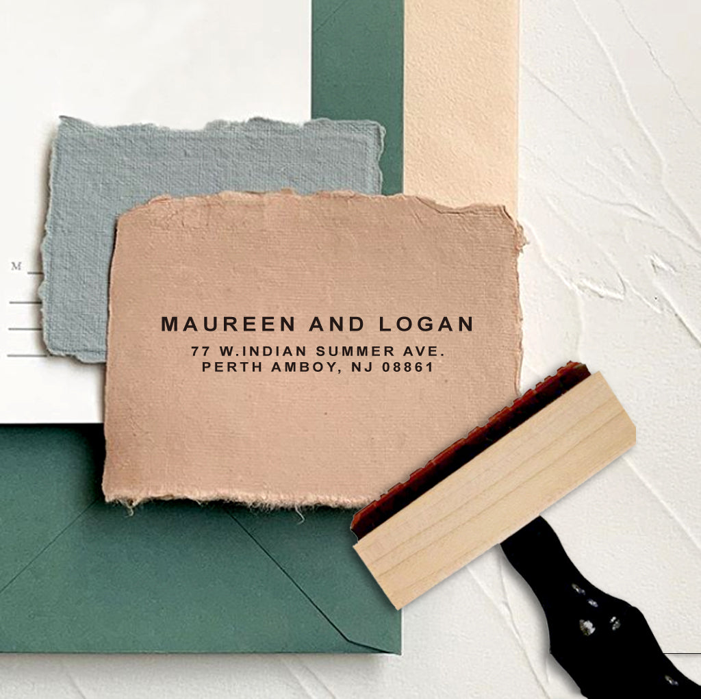 A personalized self inking address stamp, customized with your name and address, stamped on the craft paper.