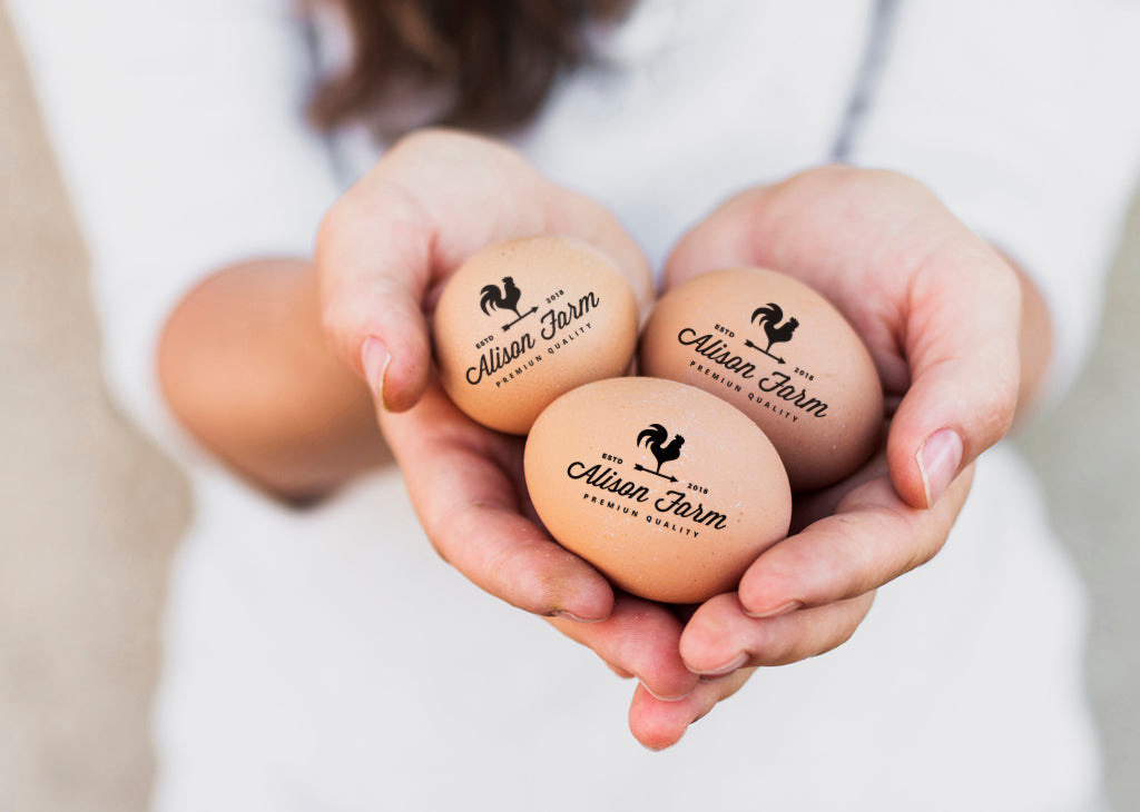 Custom Egg Stamps, with your name and chicken graphic, imprinted on the farm eggs.