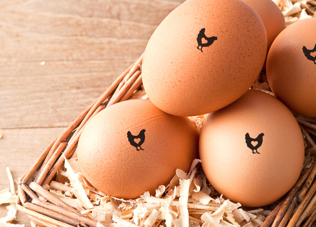 mini egg stamps, imprinted on the farm eggs with the design of heart and chicken.