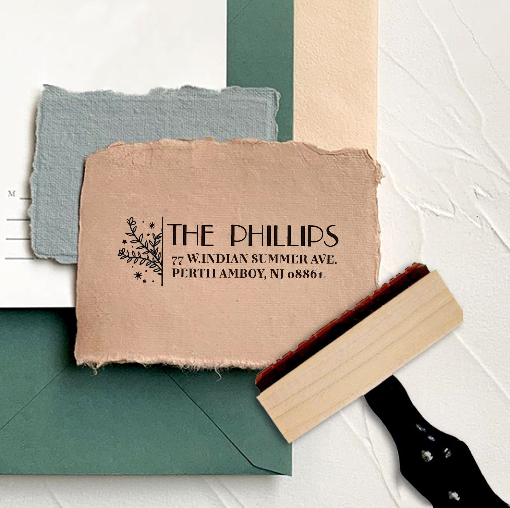 A personalized self inking address stamp, customized with your name and address, stamped on the craft paper.