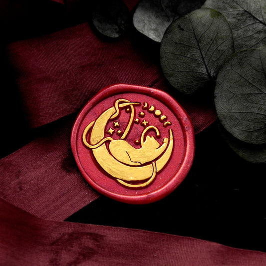 Wax Seal Stamp, created a wax seal on a red ribbon with cat moon design .