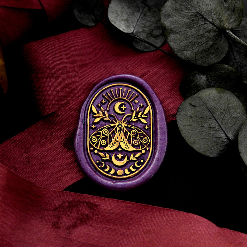 Wax Seal Stamp, created a wax seal on a red ribbon with moth moon phases design