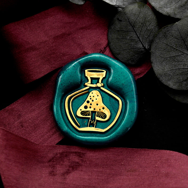 Wax Seal Stamp, created a wax seal on a red ribbon with mushroom in a bottle design