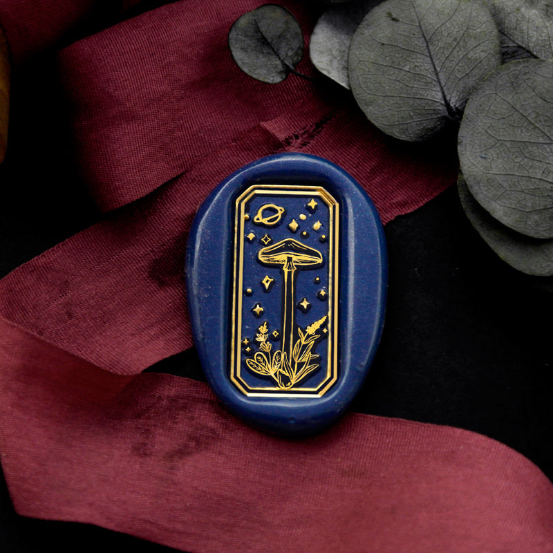 Wax Seal Stamp, created a wax seal on a red ribbon with mushroom design