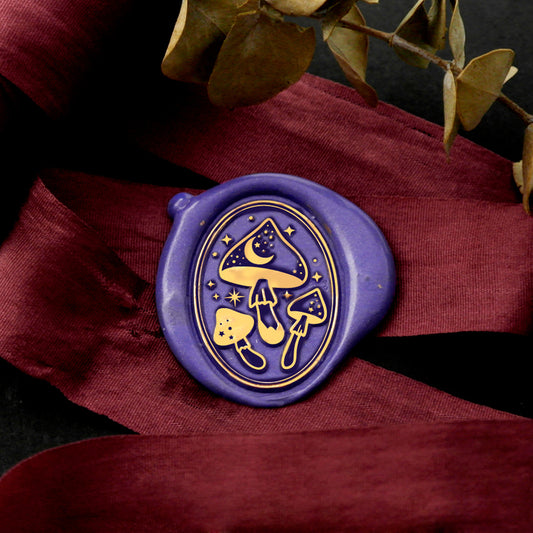 Wax Seal Stamp, created a wax seal on a red ribbon with galaxy mushrom design