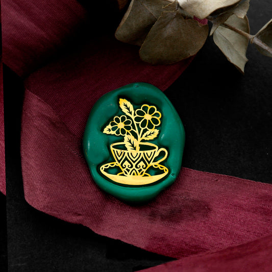Wax Seal Stamp, created a wax seal on a red ribbon with flower design