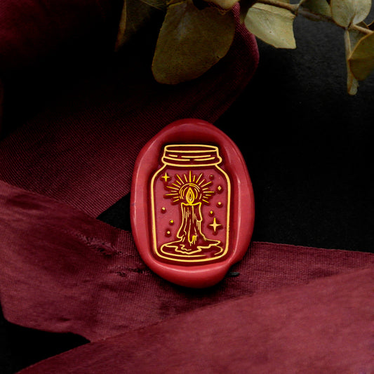 Wax Seal Stamp, created a wax seal on a red ribbon with bottle design