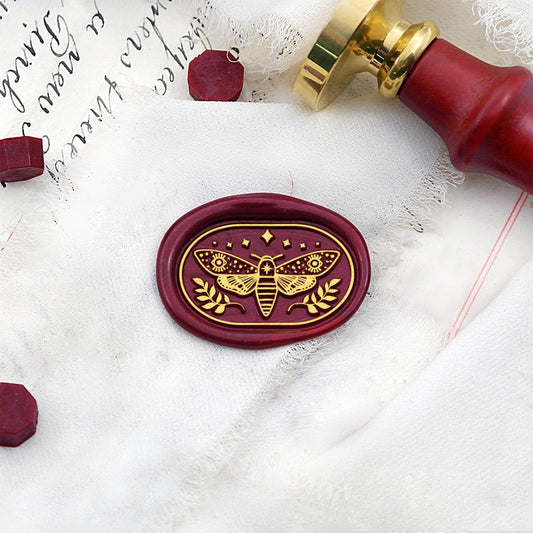Wax Seal Stamp, created a wax seal with a moth design