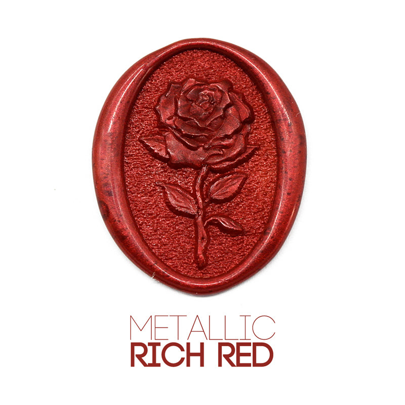 a rose flower wax seal just to show the effect of Metallic Rich Red sealing wax sticks.