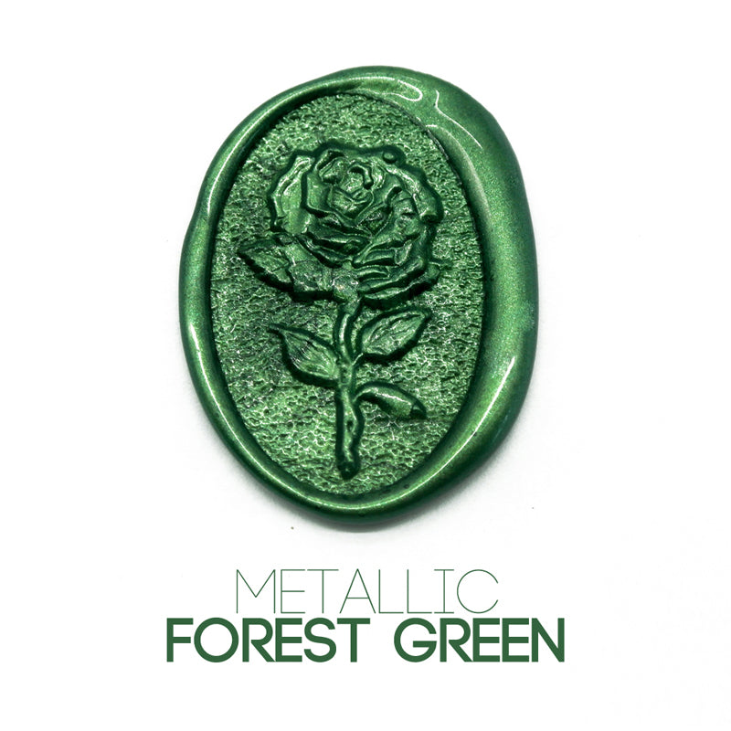 a rose flower wax seal just to show the effect of metallic forest green sealing wax beads.