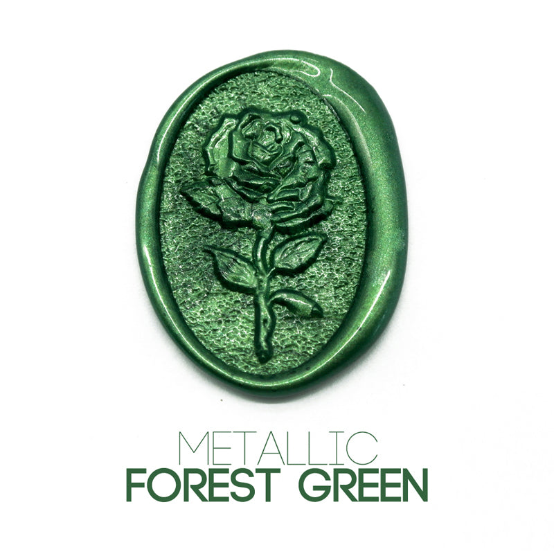 a rose flower wax seal just to show the effect of metallic forest green sealing wax sticks.