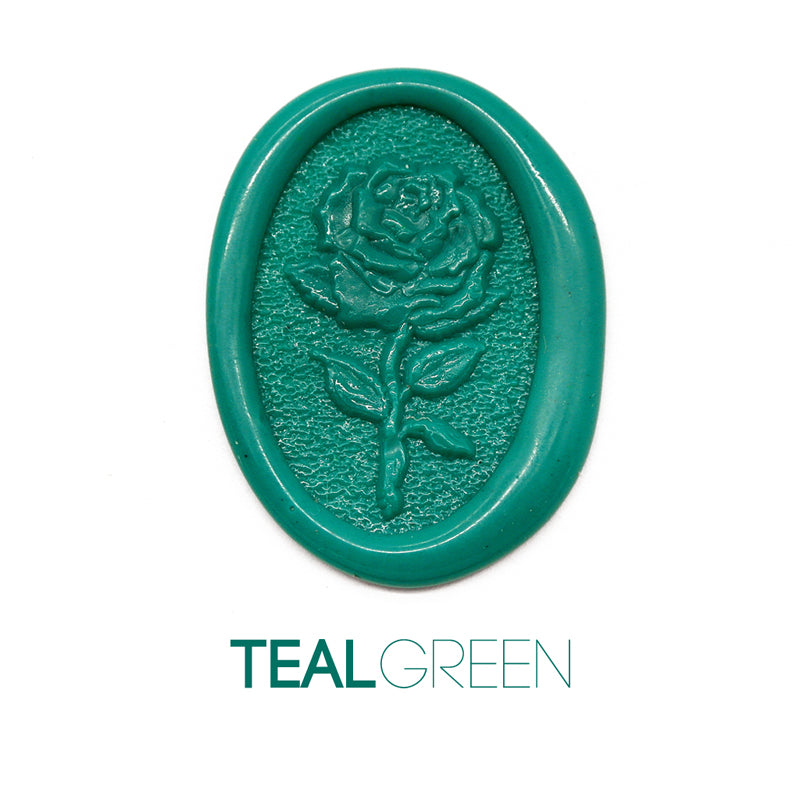 a rose flower wax seal just to show the effect of teal green sealing wax sticks.