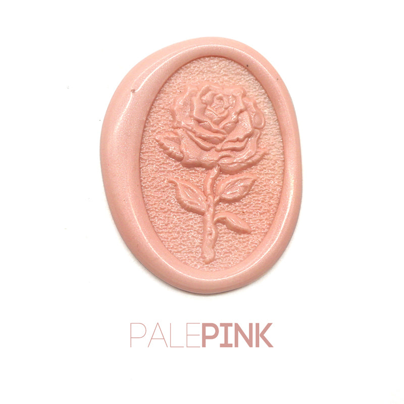 a rose flower wax seal just to show the effect of pale pink sealing wax sticks.