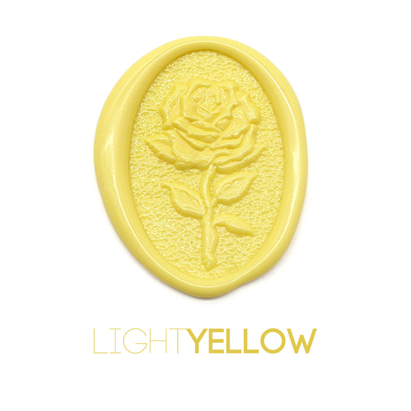 a rose flower wax seal just to show the effect of light yellow sealing wax beads.