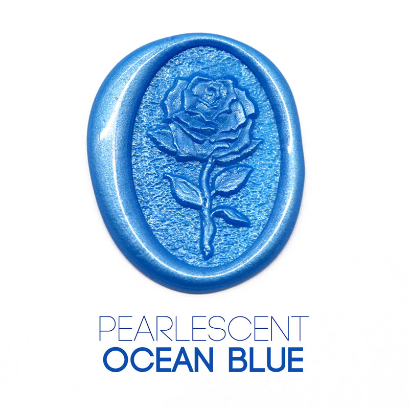 a rose flower wax seal just to show the effect of Pearlescent Ocean Blue sealing wax sticks.