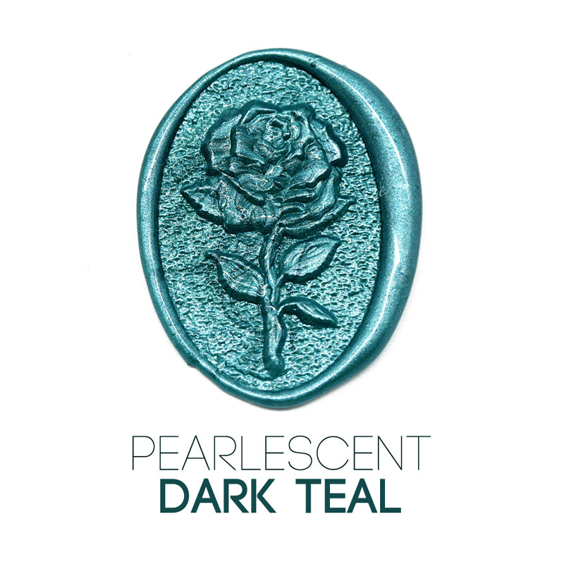a rose flower wax seal just to show the effect of pearlescent dark teal sealing wax beads.