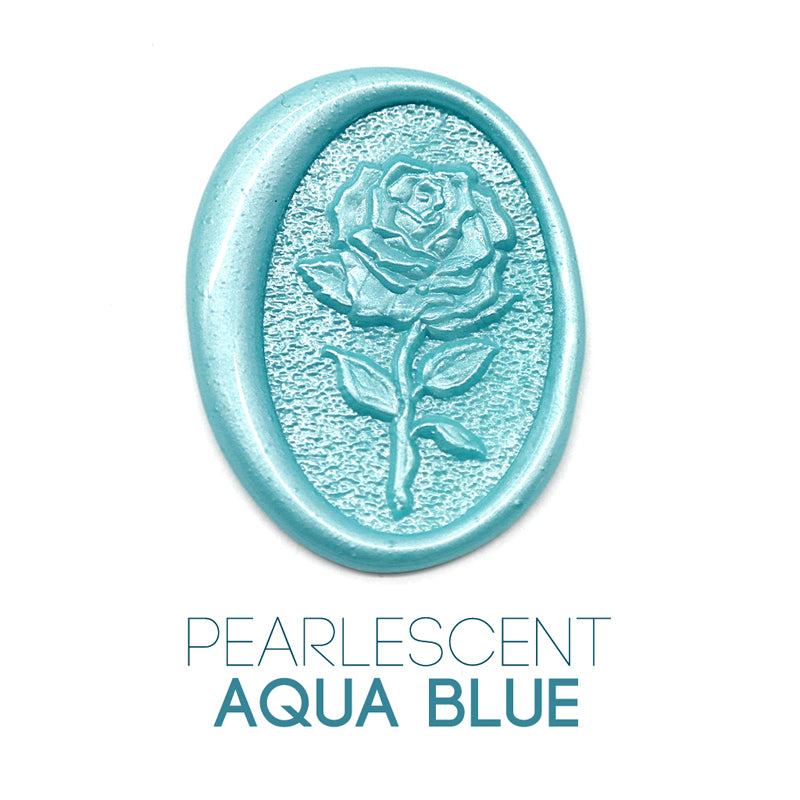 a rose flower wax seal just to show the effect of pearlescent aqua blue sealing wax beads.