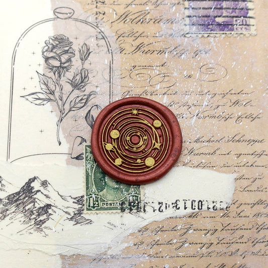 Wax Seal Stamp, created a wax seal with planets and stars design .