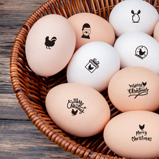 mini egg stamps, imprinted on the farm eggs with the design of merry christmas.