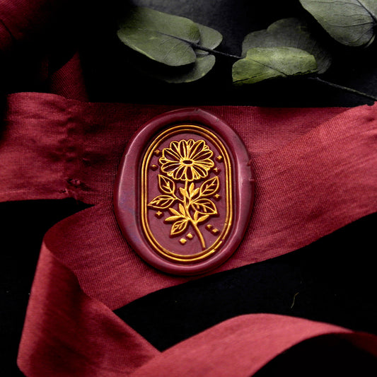 Wax Seal Stamp, created a wax seal on a red ribbon with stars flower design