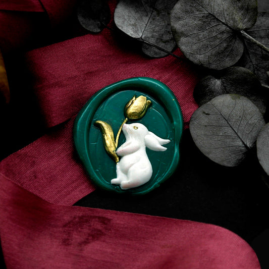 Wax Seal Stamp, created a blue wax seal on red ribbon with 3D easter bunny design .