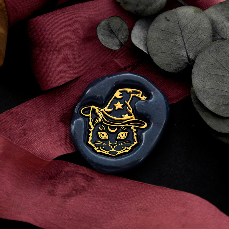 Wax Seal Stamp, created a wax seal on a red ribbon with galaxy universe cat halloween hat design