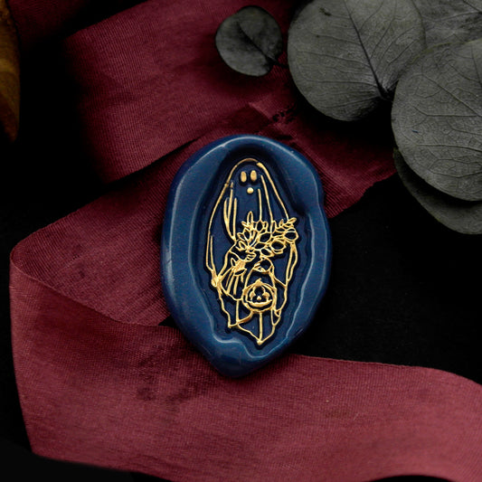 Wax Seal Stamp, created a wax seal on a red ribbon with skeleton ghost halloween design