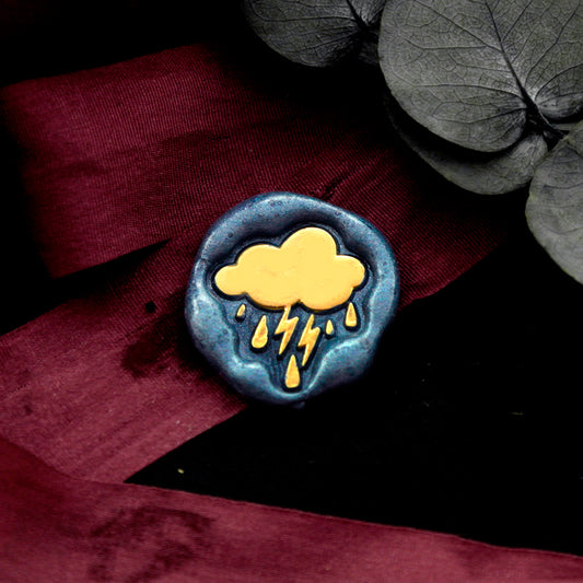 Wax Seal Stamp, created an wax seal on a red ribbon with cloud rain lightning weather design