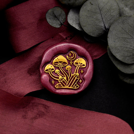 Wax Seal Stamp, created an wax seal on a red ribbon with galaxy mushroom design