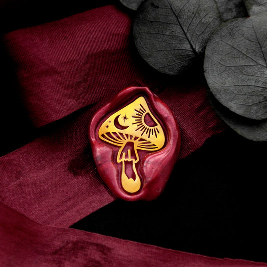 Wax Seal Stamp, created an wax seal on a red ribbon with galaxy mushroom design