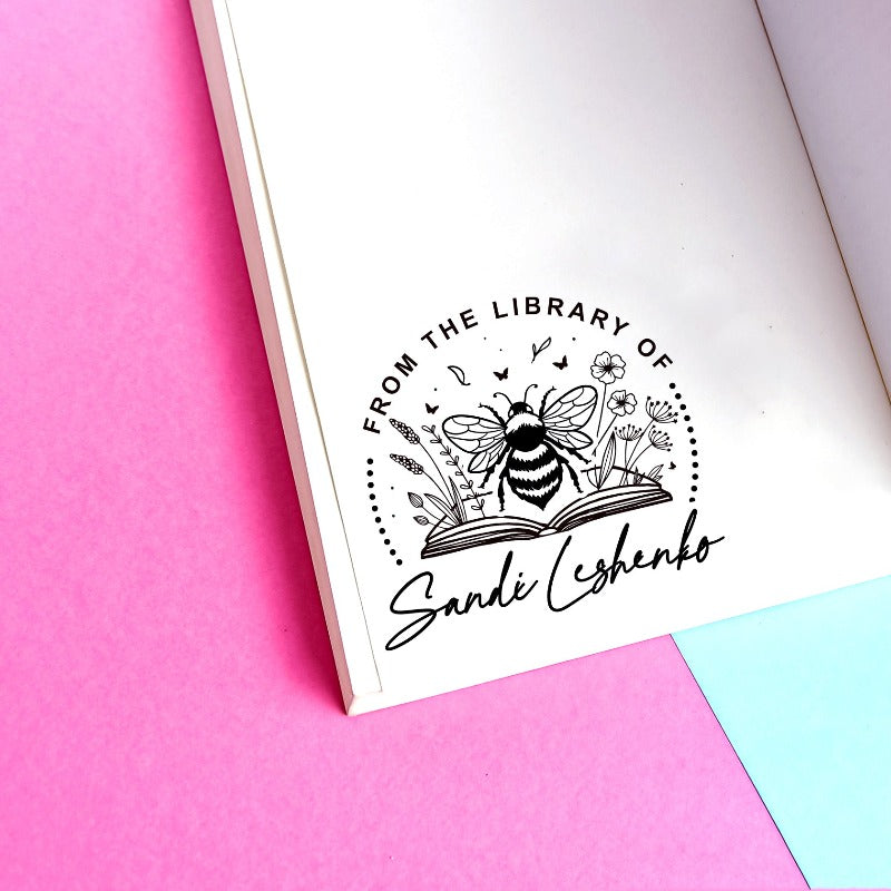 Custom your Book Stamp, with text from the library of your name , bee and books graphic.
