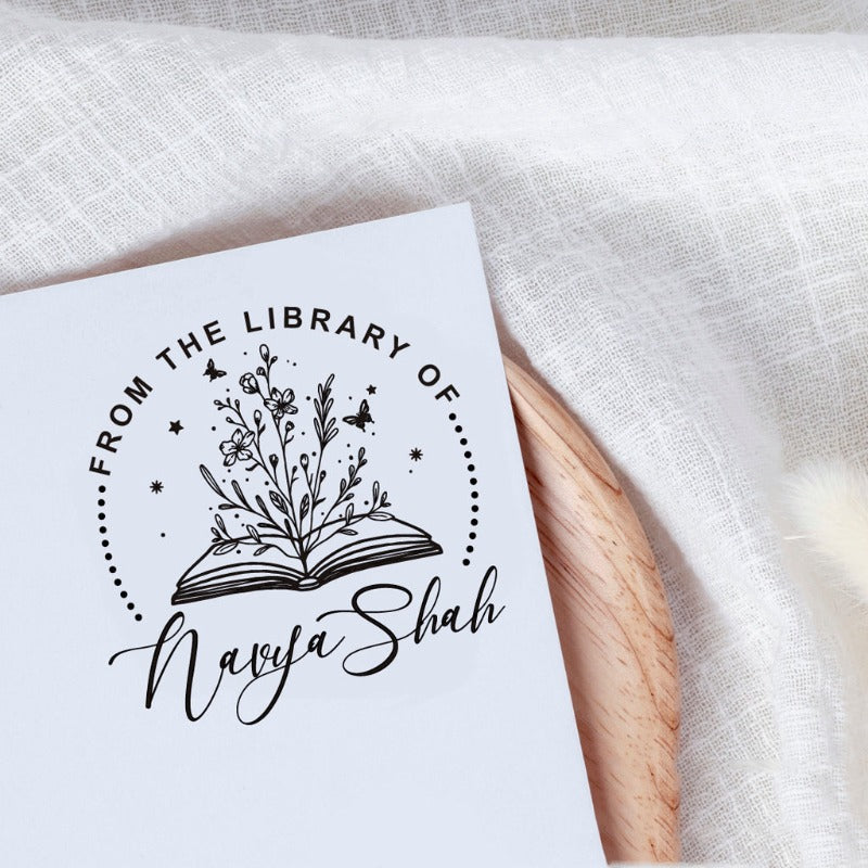 Custom your Book Stamp, with text from the library of your name, butterflies, Flowers and books graphic.