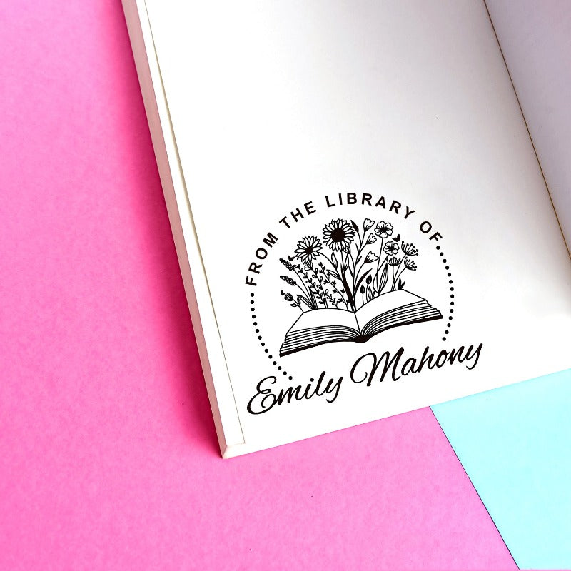 Custom your Book Stamp, with text from the library of your name, sunflowers and book graphic.