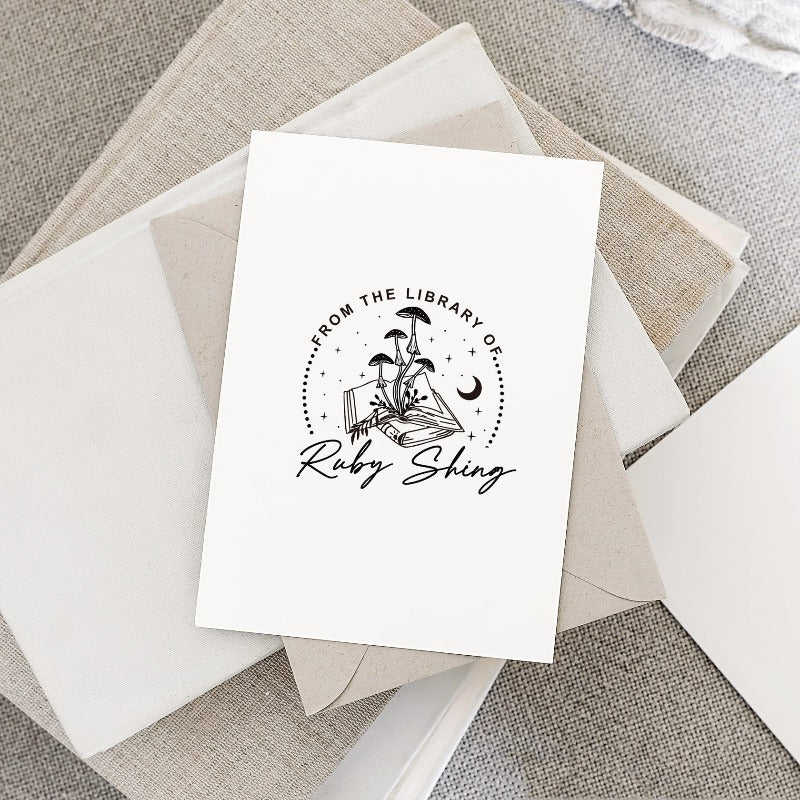Custom your Book Stamp, with text from the library of your name, mushroom and books graphic.