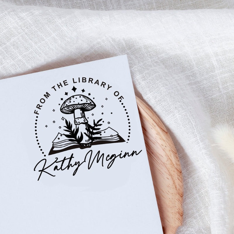 Custom your Book Stamp, with text from the library of your name, mushroom and book graphic.