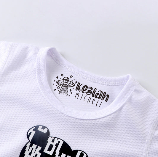Customized clothing stamp, imprinted on a white clothes. The custom name at the right side of the UFO and the stars around the UFO.