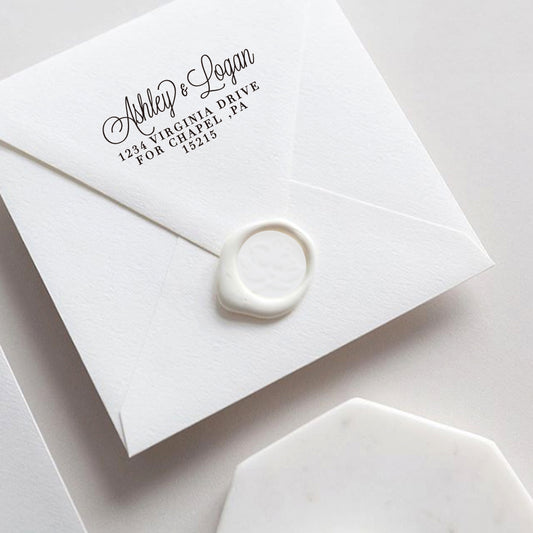 A wedding self inking return address stamp, customized with your name and address, stamped on the white envelop of invitation card, a wax seal sealed the envelope.