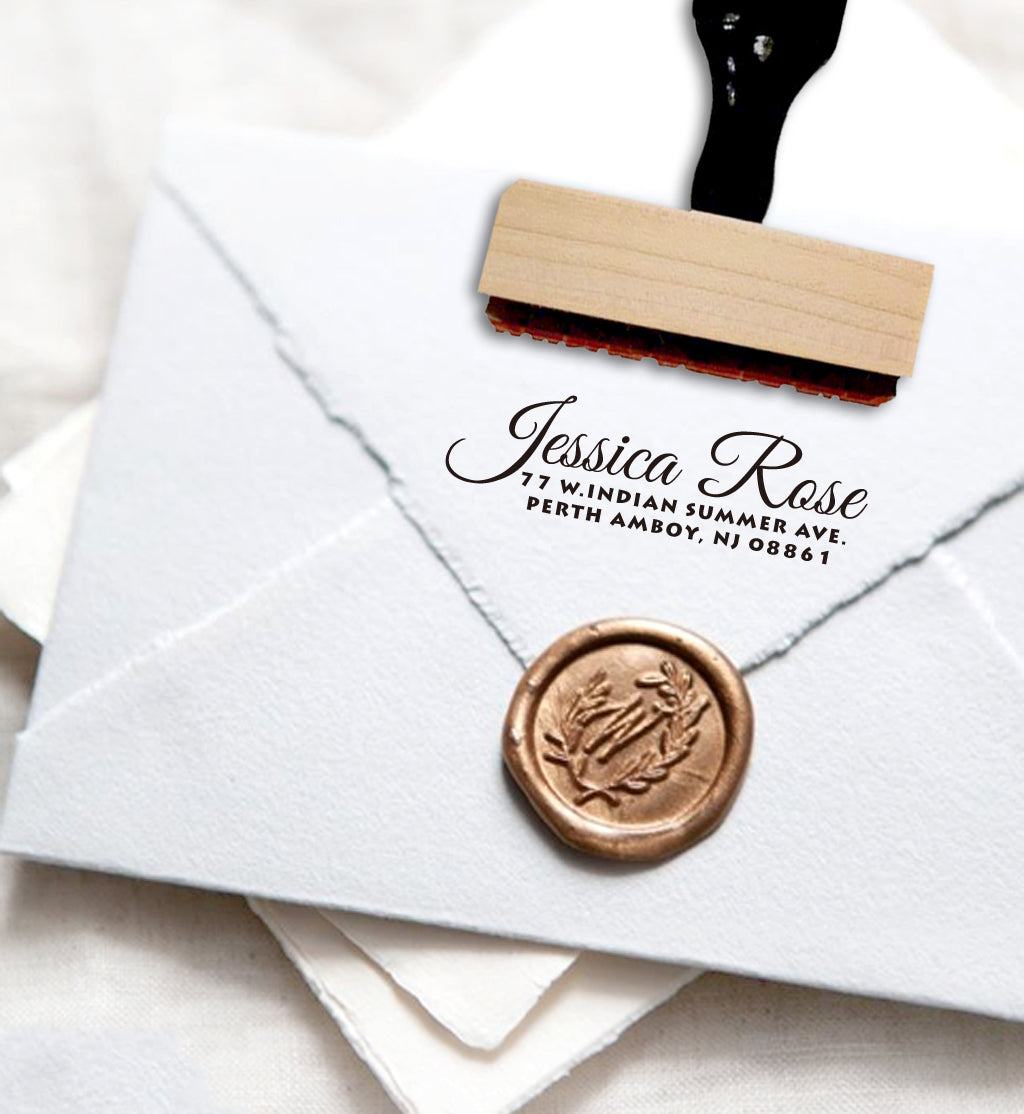 A personalized self inking wedding address stamp, customized with your name and address, stamped on the white envelope of invitation card, a wax seal to cover the envelope.