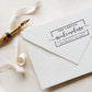A personalized self inking address stamp, customized with your shop name and address, stamped on the white envelop, beside it, a ribbon is waiting for packing the gift.