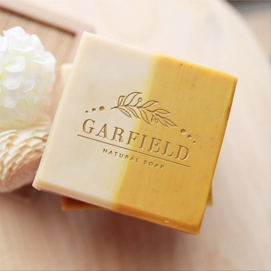 Custom Soap Stamp, with flower and your name, and "natural soap" design, printed on handmade soap.