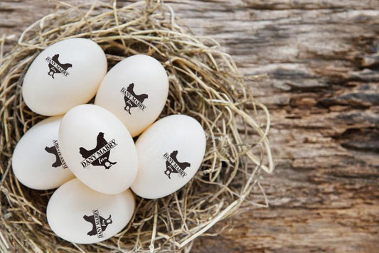 Custom Egg Stamps, with your name and hen graphic, imprinted on the farm eggs.